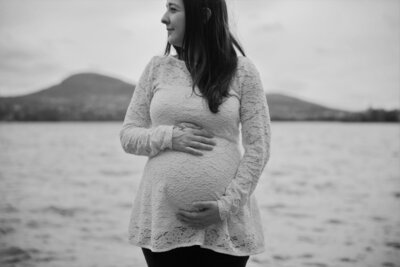 Photo of Expecting Mother holding belly | Maternity Photographer