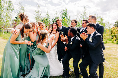 Portrait of bride and groom with wedding party at Shades of Green Events in Helena, MT