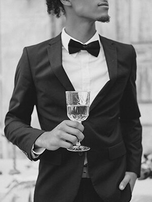 Black Groom with Champagne