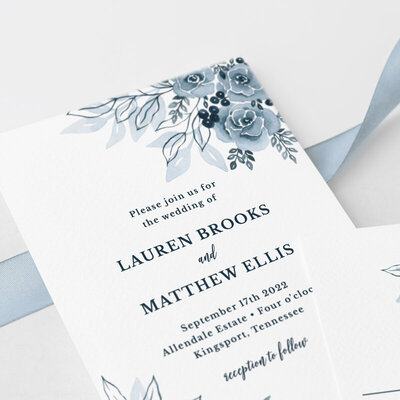 dusty blue wedding invitation set with watercolor flowers