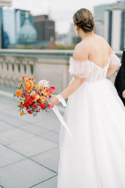 Contemporary, artful, and colorful fall wedding at a Historic Library with a Roof Terrace Overlooking the City with Shannon Wellington wedding planner and designer | The Free Library of Philadelphia | Philadelphia PA | Denise Marie Photography | Editorial Wedding Photographer based in Philadelphia PA