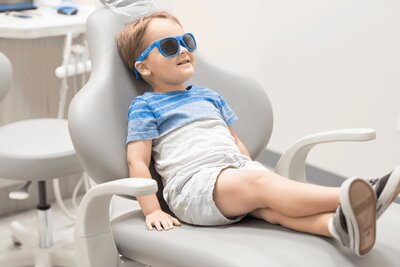 Kid in Thrive Dental Allen Office