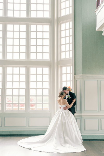 Wedding at the Estate at River Run in Maidens, VA | Wedding Photographer in Richmond | bride and groom looking at each other while they hug in their Richmond wedding venue