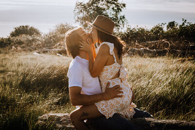 A couple madly in love during golden hour at Mud Bay, Surrey