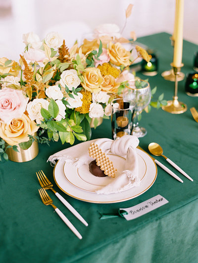 Green and yellow wedding place setting
