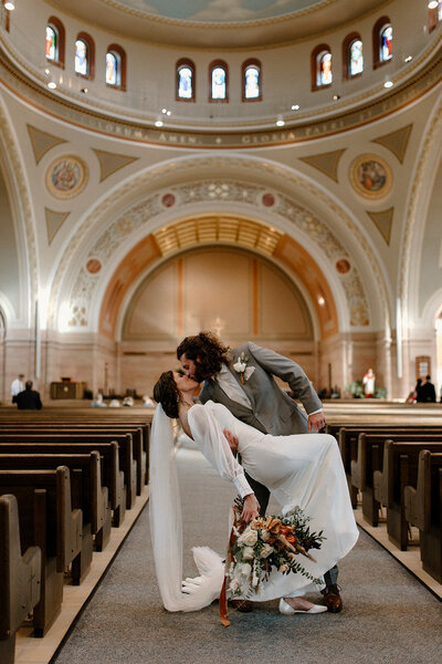 groom kissing bride passionately