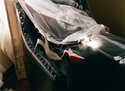 editorial bridal couple at the bar at Riverwood mansion captured on film 