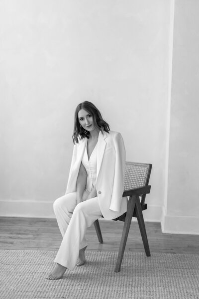 Leigh Anne Kuzma, Registered Nurse and founder of Rove Skin and Wellness, showcasing confidence and warmth.