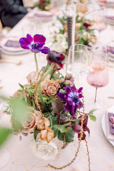 Florals at a styled shoot in 620 loft and gardens in NYC with purple and pink flowers