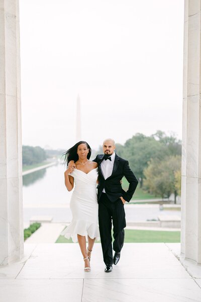 couple walking at the lincoln memorial for anniversary session by costola photography