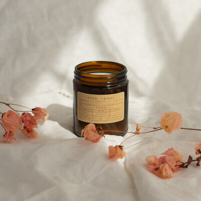 Copenhagen travel themed candle with wood wick and natural soy in a reusable container