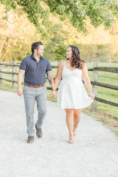 Couple holding hands walking