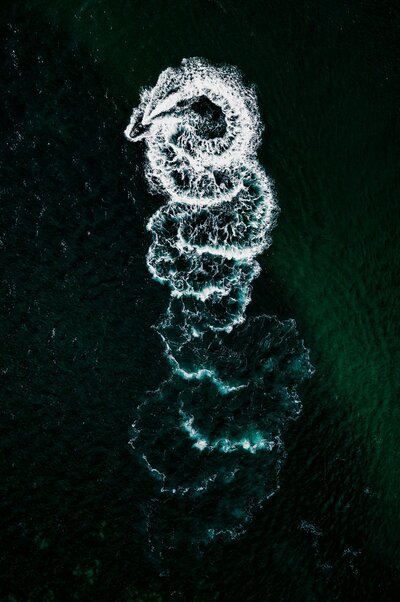 Aerial view of a spiral wake pattern symbolizing organizational behavior mapping.