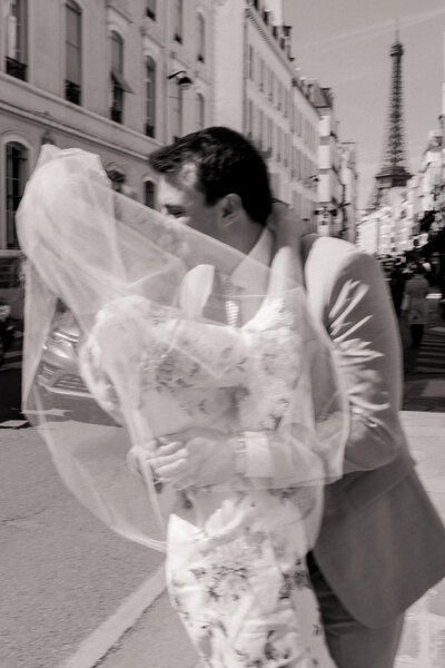 Couple kissing and holding hands