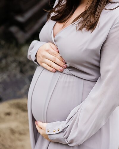Portland Mom in Grey dress for maternity photos