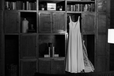 colorado elopement planning guide - bride's dress hangs in detail photo during sunrise elopement in the mountains