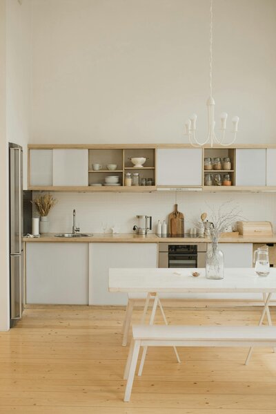 JSF Design entryway featuring a custom light, statement art, and a styled console