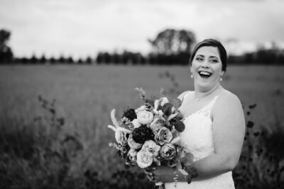 Heather Arra, owner of Girasole Co., radiates professionalism and warmth in her headshot, embodying expertise and dedication in the wedding industry.