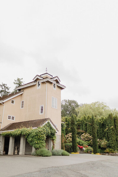 A close-up of the Chateau Lill, featuring ivy-covered walls and timeless design elements