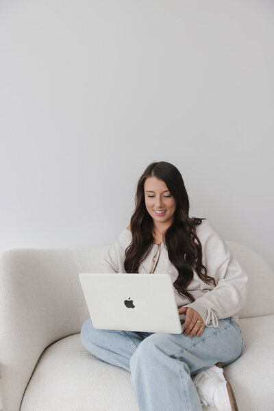 Danielle browsing on laptop