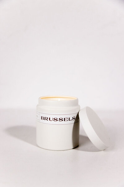 Brussels travel themed candle with wood wick and natural soy in a reusable container