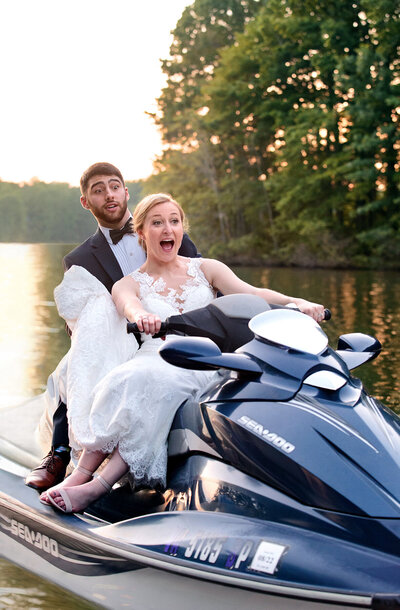fun-loving-couple-jetski-in-wedding-gown-at-lake-anna-virginia
