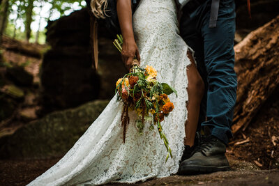 bride and groom with bouquet