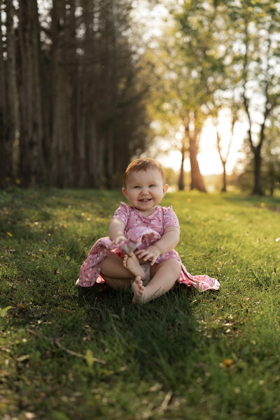 sweet baby and mom at coxhall gardens for first birthday portraits