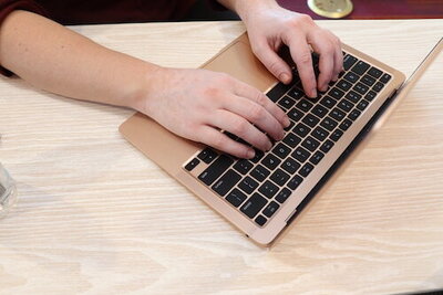 hands-typing-laptop