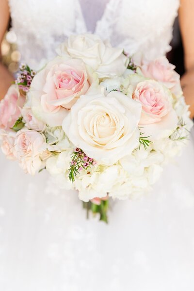 bride holds her wedding bouquet