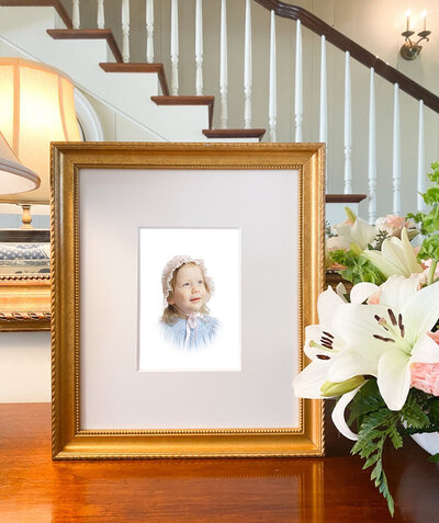 Framed heirloom portrait by Caroline Eidson Tulsa Heirloom Photographer of toddler girl on table in entry way of house 