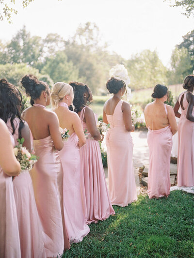 Bridal party stands at outdoor altar at Glen Ellen Farm