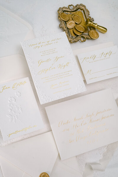 Gold foil calligraphy invitation suite with ivory envelopes
