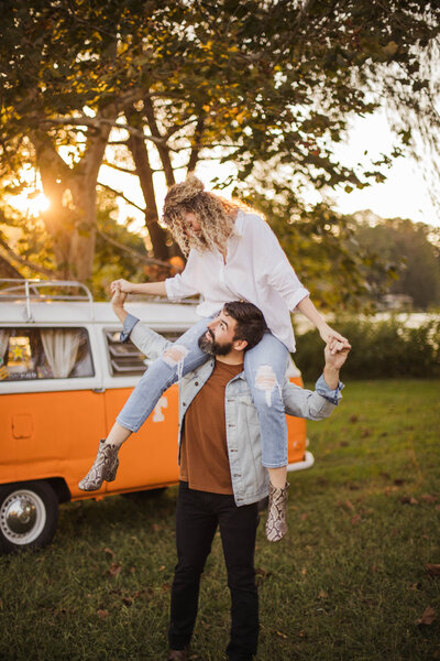 couple hugging on beach during engagement session