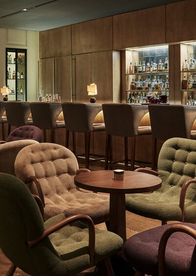 Hotel bar with green, brown and plum