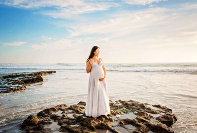 Carlsbad maternity photographer Tristan Quigley captures a gorgeous mama on the beach during her maternity photography session