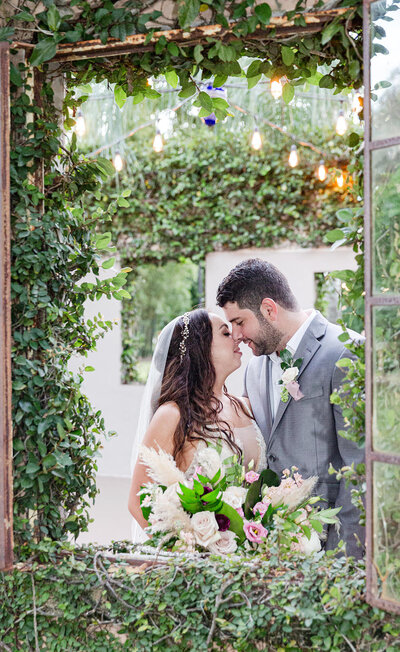 Jacksonville bridal couple in a lush greenery