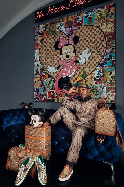Candid portrait of Todrick Hall in a floral suit, exuding personality, captured by Ylva Erevall.