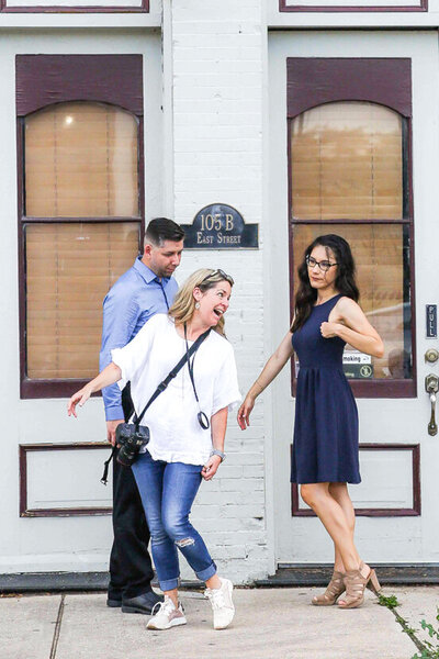 wedding photographer directing couple