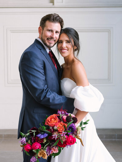 Bride and Groom with Colorful Bouquet