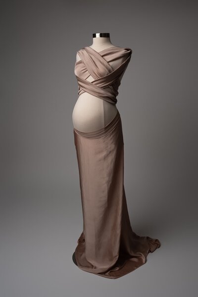 Dusty pink two-piece maternity fabric styled on mannequin