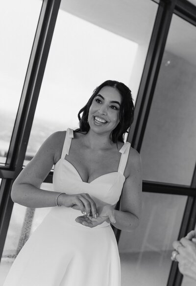 Bride smiling at her wedding taken by east coast wedding photographers