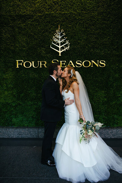 Bride-Groom-Kissing-Four-Seasons-Chicago-Wedding