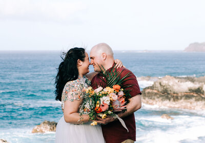 Hawaii Elopement with couple smiling and kissing