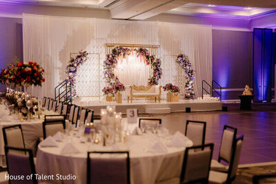 Wedding reception with large floral installation