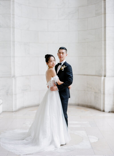 Bride in Mira Zwillinger gown at New York Public Library