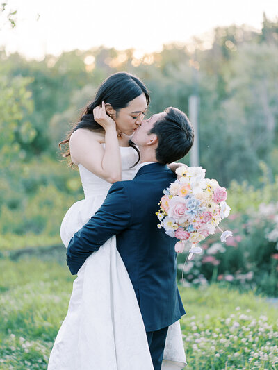 bride and groom at sunset at saskatoon farm