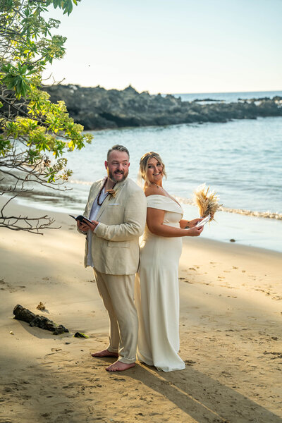 Elopement photos on beach by kona wedding photographer