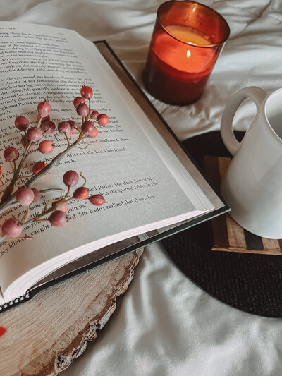 Cozy Book With Candle and Coffee