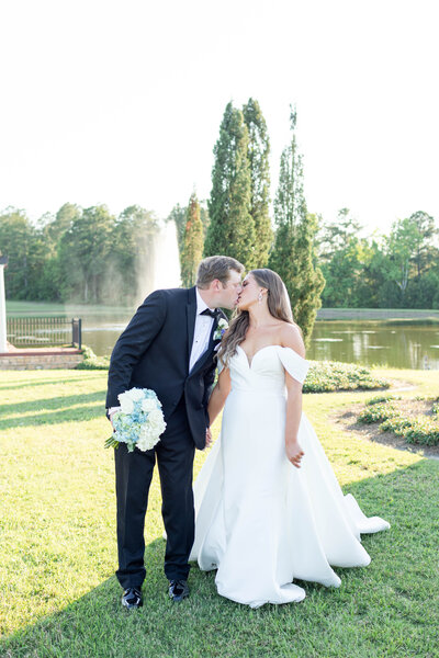 Light and airy wedding portrait of couple in romantic destination venue